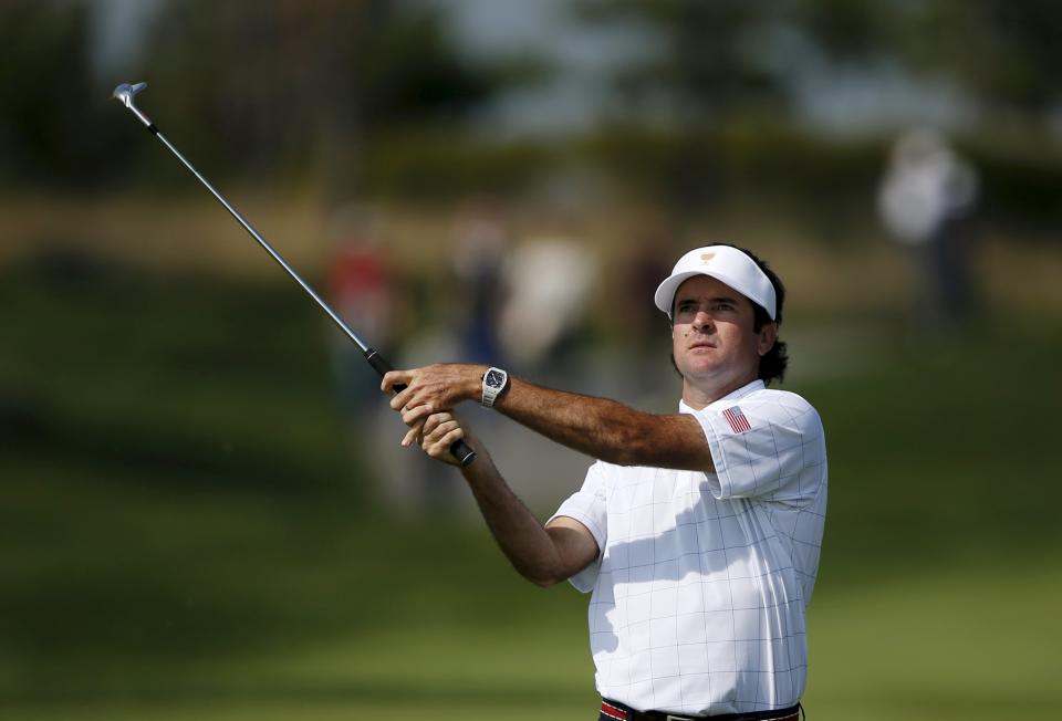 U.S. team member Bubba Watson watches his shot on the second fairway during the opening foursome matches of the 2015 Presidents Cup golf tournament at the Jack Nicklaus Golf Club in Incheon