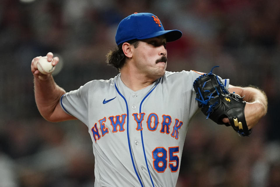 New York Mets relief pitcher Stephen Nogosek works in the sixth inning of the team's baseball game against the Atlanta Braves on Tuesday, Aug. 16, 2022, in Atlanta. (AP Photo/John Bazemore)