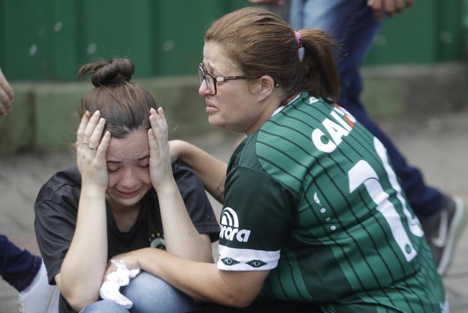 <p>Fans of Brazil’s soccer team Chapecoense mourn outside the Arena Conda stadium in Chapeco, Brazil, Tuesday, Nov. 29, 2016. A chartered plane that was carrying the Brazilian soccer team to the biggest match of its history crashed into a Colombian hillside and broke into pieces, killing 75 people and leaving six survivors, Colombian officials said Tuesday. (AP Photo/Andre Penner) </p>