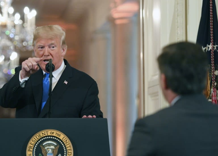 President Donald Trump points to Acosta during a post-election press conference in the White House, an exchange that led to Acosta's ban by the administration