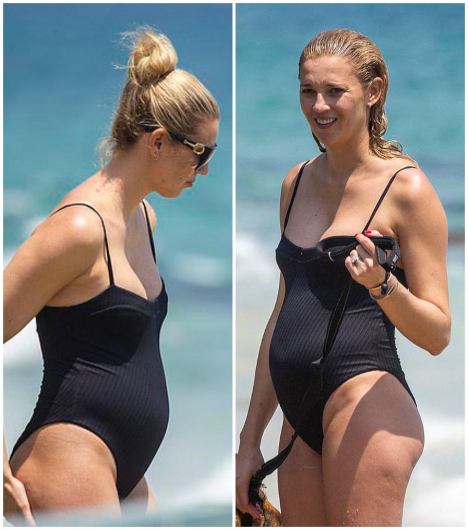 Jasmine Yarbrough in a black one-piece swimsuit in Byron Bay