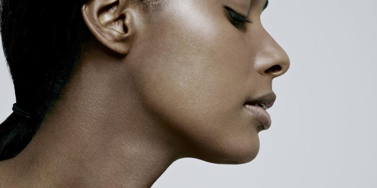 close up of black girl side of face and neck