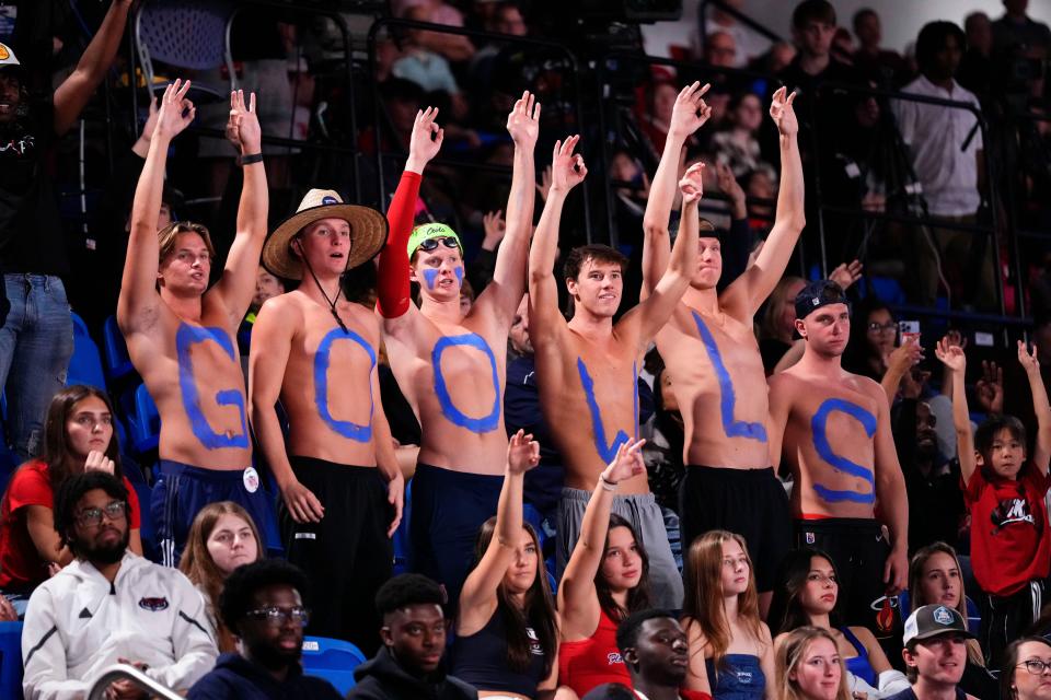 These FAU students put their allegiance on their chests during a home game against East Carolina on Jan. 2.