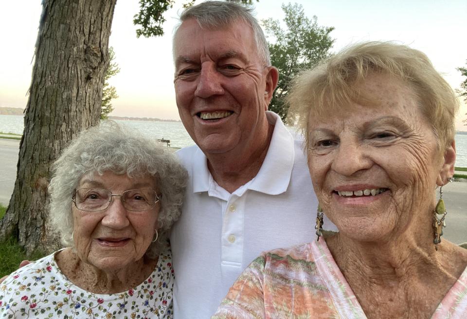 Craig and Nancy Fratzke took this selfie near the shores of Storm Lake with their 95-year-old road warrior friend, Marti Strait, who thinks nothing of driving alone from Texas to Michigan and back.