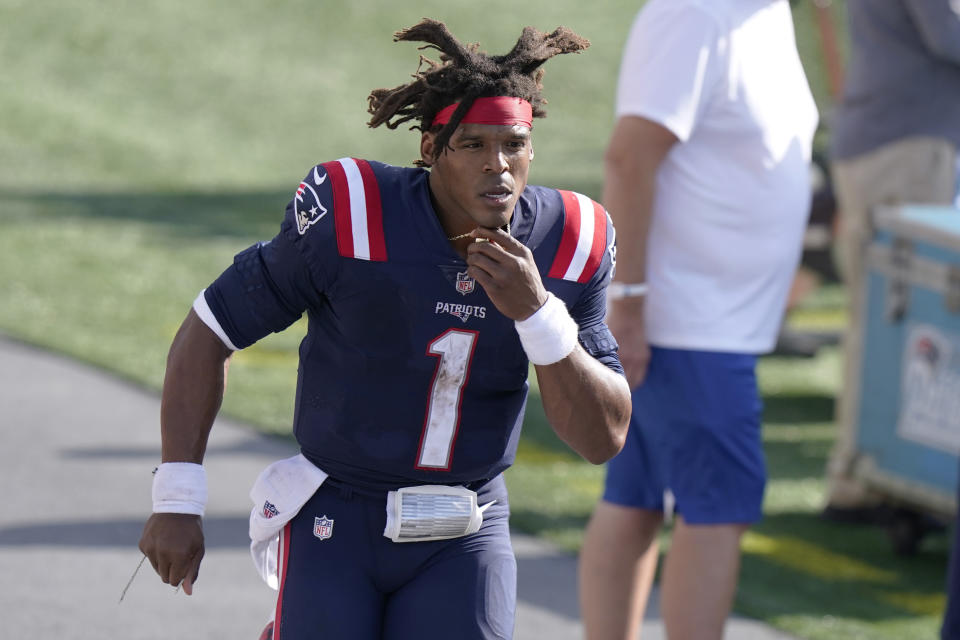 New England Patriots quarterback Cam Newton leaves the field after an NFL football game against the Miami Dolphins, Sunday, Sept. 13, 2020, in Foxborough, Mass. (AP Photo/Steven Senne)