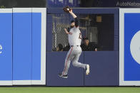 San Francisco Giants right fielder Austin Slater (13) catches a hit by Miami Marlins' Jazz Chisholm Jr., during the first inning of a baseball game, Wednesday, April 17, 2024, in Miami. (AP Photo/Marta Lavandier)