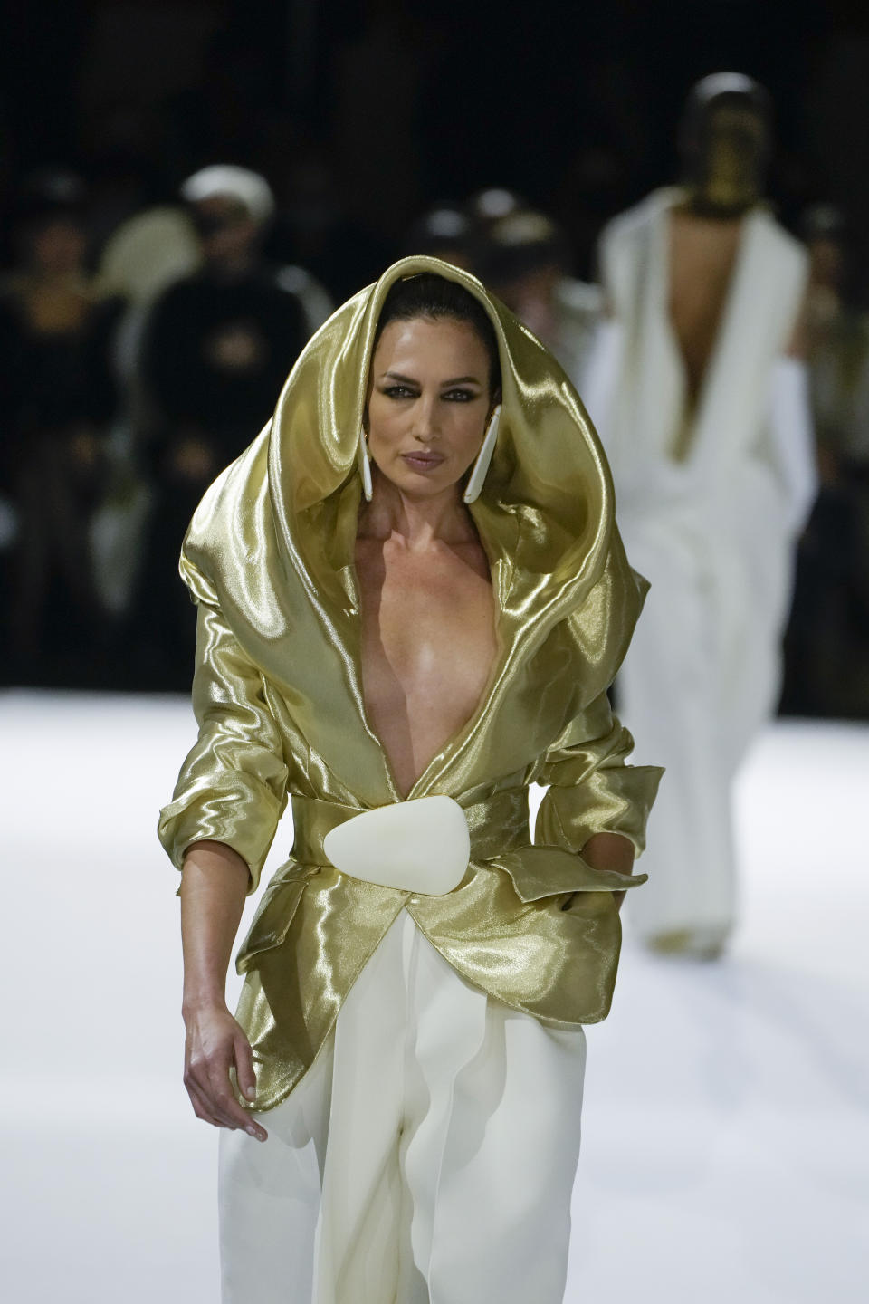 Nueves Alvarez wears a creation for the Stephane Rolland Spring-Summer 2022 Haute Couture fashion collection collection, in Paris, Tuesday, Jan. 25, 2022. (AP Photo/Francois Mori)