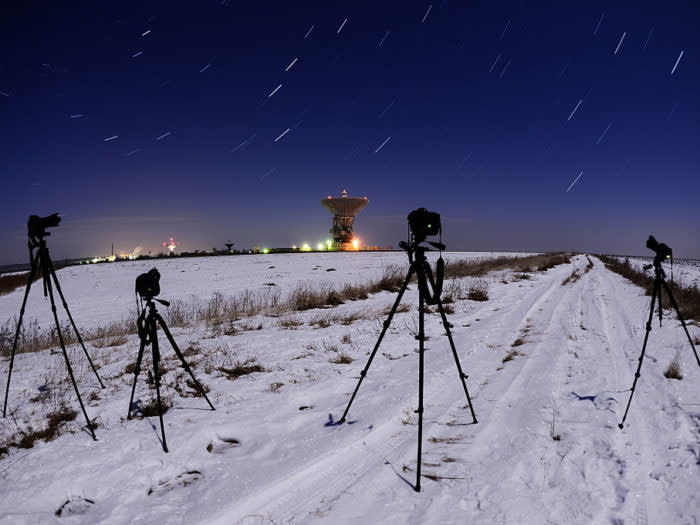 PRIMORYE TERRITORY, RUSSIA - DECEMBER 15, 2016: The night sky over the Galenki RT-70 radio telescope at a Kvant-D command and measurement complex which is part of the Titov Main Space Test Centre, during the Geminids meteor shower. Yuri Smityuk/TASS (Photo by Yuri SmityukTASS via Getty Images)