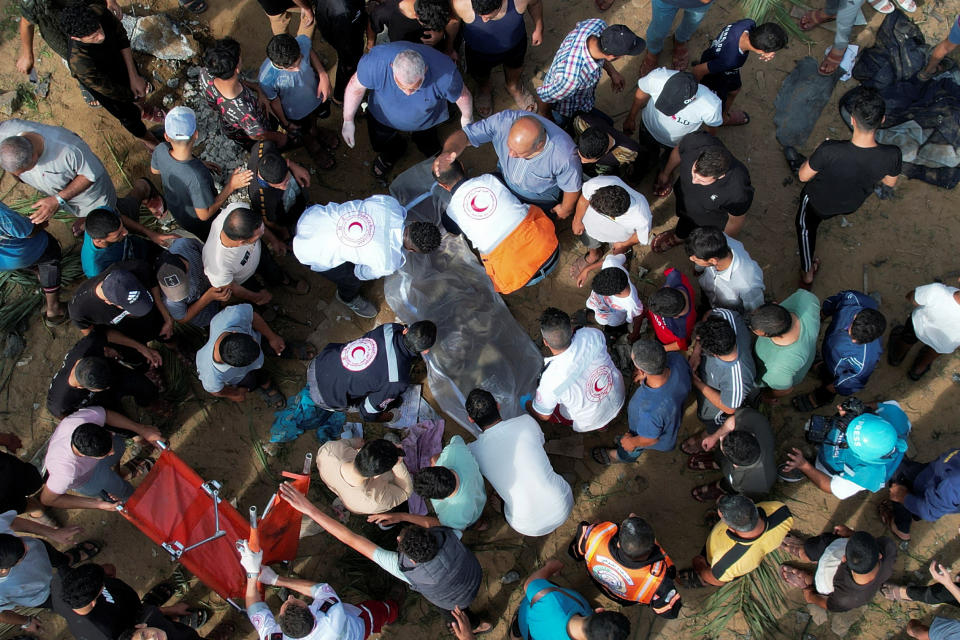 A search for bodies following Israeli strikes on a house in the central Gaza Strip.