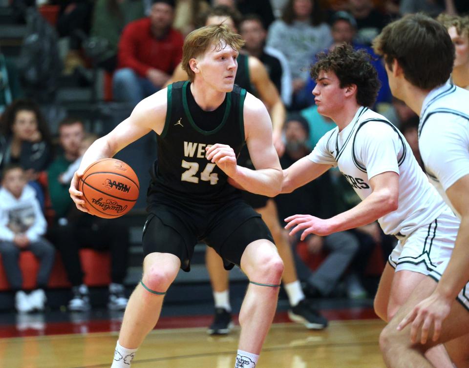 The Zeeland West boys basketball team won the Division 1 regional championship on Thursday, March 7, 2024, over Forest Hills Central at East Kentwood.