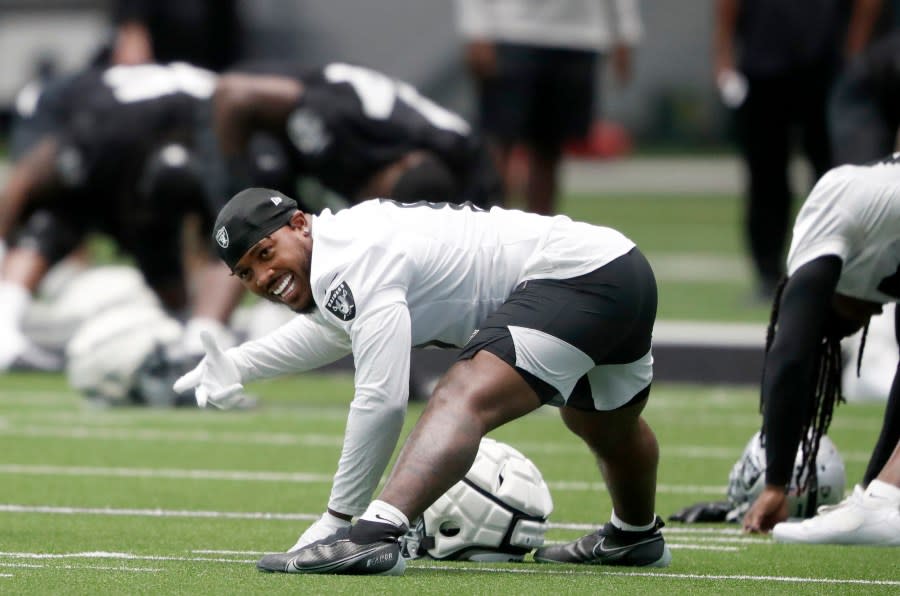 Las Vegas Raiders running back Josh Jacobs warms up during practice at the Raiders Headquarters/Intermountain Health Performance Center, Wednesday, Aug. 30, 2023, in Henderson, Nev. (Steve Marcus/Las Vegas Sun via AP)