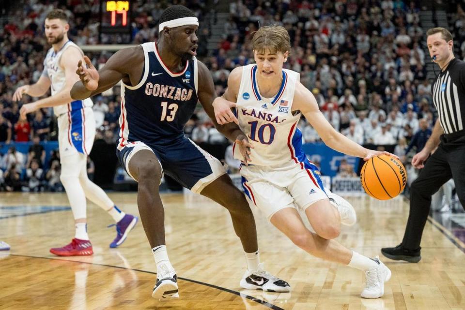 Gonzaga Bulldogs forward Graham Ike (13) guards Kansas Jayhawks guard Johnny Furphy (10) during a men’s college basketball game in the second round of the NCAA Tournament on Saturday, March 23, 2024, in Salt Lake City, Utah. Nick Wagner/nwagner@kcstar.com