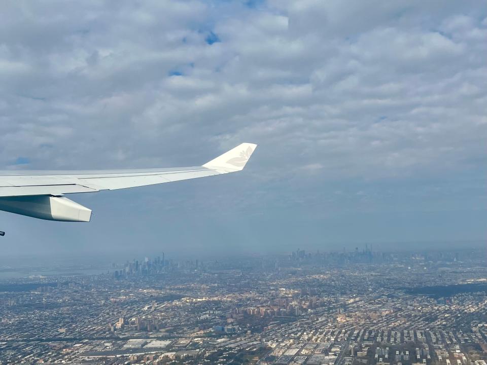 A view of the NYC skyline from an airplane.