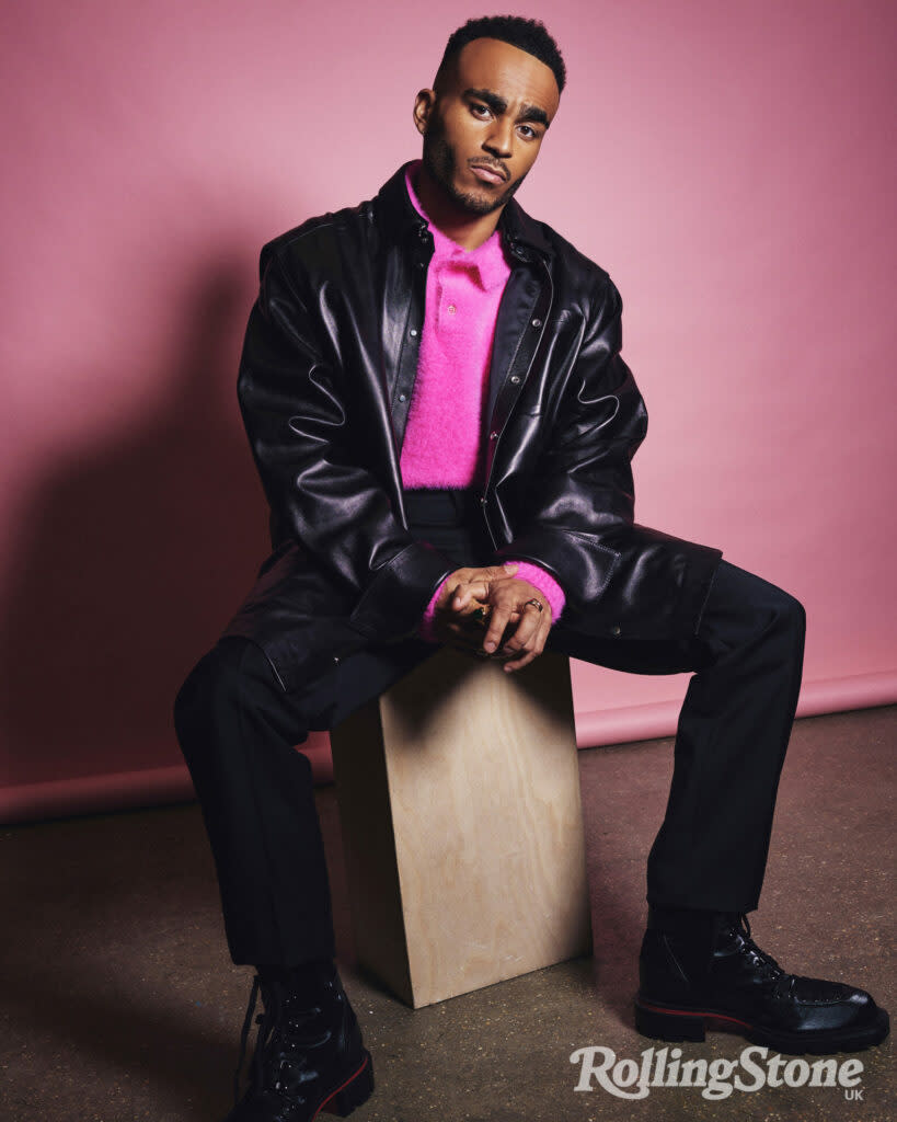 Munya wears leather jacket by At.Kollektive, knitwear by Jacquemus at Matches, trousers by BOSS, boots by Christian Louboutin, rings (on left) by Thomas Sabo, ring (on right) by Pawnshop London. Photography by Mark Cant