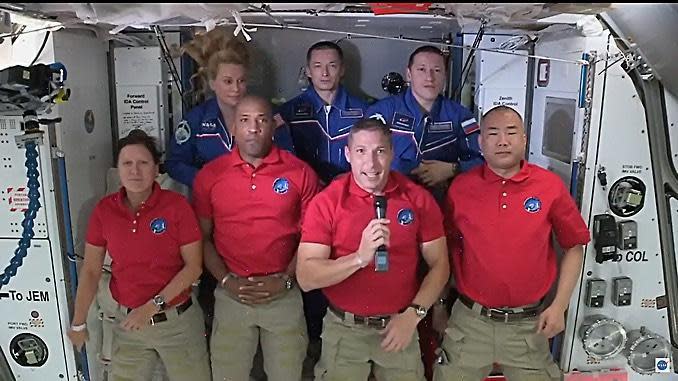 The expanded, seven-member crew of the International Space Station: Crew Dragon astronauts, front row, left to right): Shannon Walker, Victor Glover, Michael Hopkins and Japanese astronaut Soichi Noguchi. Expedition 64 crew, back row, left to right: Kate Rubins, Sergey Ryzhikov and Sergey Kud-Sverchkov. / Credit: NASA