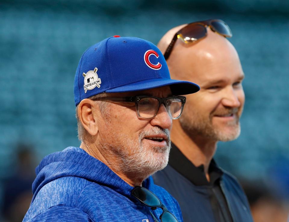 Joe Maddon (left) with former catcher David Ross before Game 4 of the 2017 NLCS playoff baseball series against the Los Angeles Dodgers at Wrigley Field.
