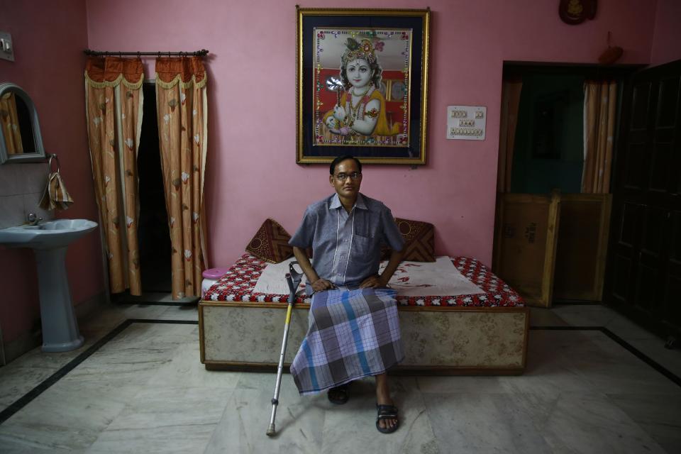 In this April 15, 2014 photo, Ramesh Agrawal speaks during an interview at his house in Raigarh in Chhattisgarh state, India. Agrawal is one of a growing number of unlikely heroes in India helping small, marginalized communities take on the huge government projects or corporate behemoths in court. He is also one of this year's six recipients of this year's $175,000 Goldman Environmental Prize, often called "Green Nobel." (AP Photo/Rafiq Maqbool)