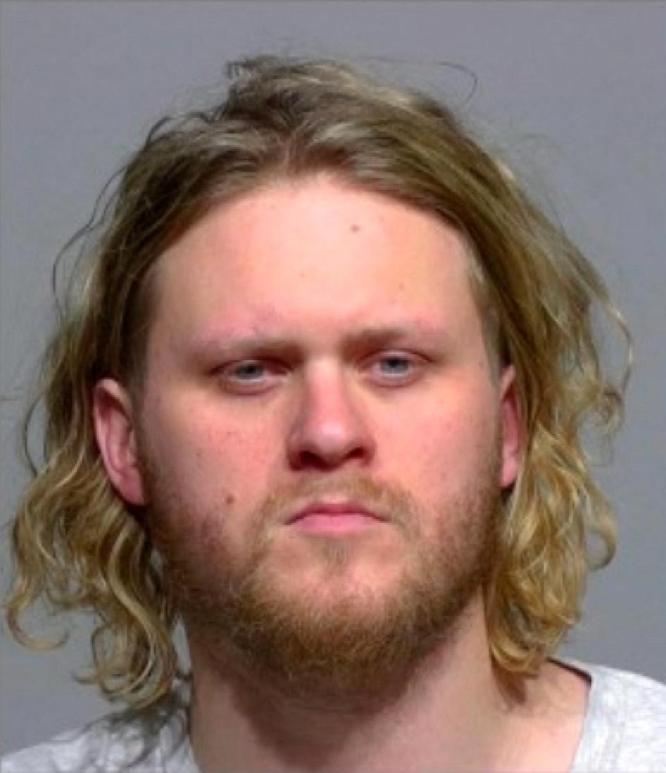 Surveillance footage from the Twisted Fisherman restaurant in Milwaukee showed Robinson having drinks at the bar Maxwell Anderson, 33, (pictured) on April 1. He has been charged with first-degree intentional homicide, mutilating a corpse and arson (AP)