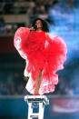 <div class="caption-credit"> Photo by: Getty Images</div>At the Superbowl halftime show in Arizona, 1996 <br> Now this is how you make an entrance. Red tulle dress, red pumps, red lips. When millions of eyes are on Diana she makes it count. <br> <br>