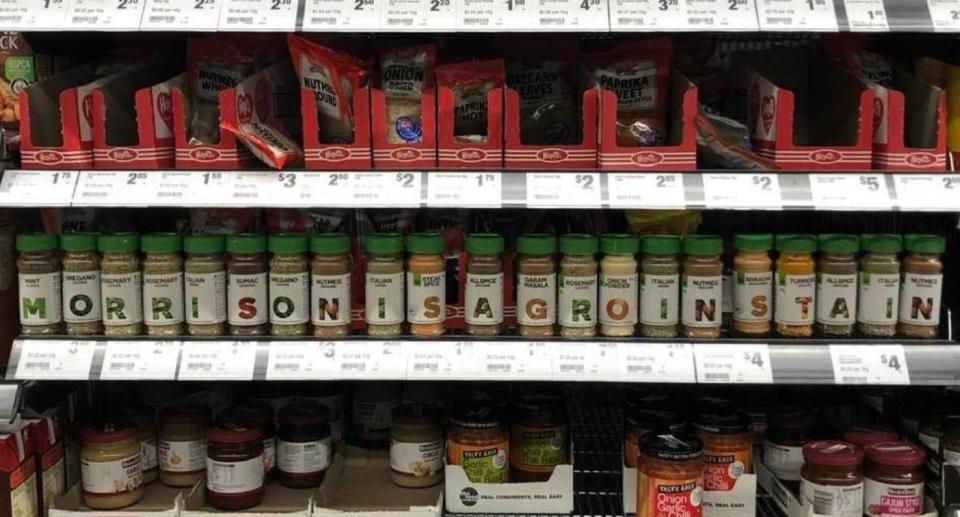 Woolworths spice jars arranged to spell 