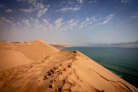 <p>The massive sand dunes alone are reason to book a trip to Walvis Bay. But you'll also want to come to this beach on Namibia's Skeleton Coast for the wildlife—you're likely to spot flamingos, seals, whales and even hyenas here.</p>