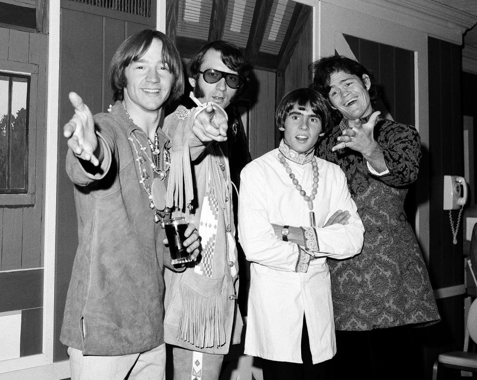 This July 6, 1967, file photo shows Peter Tork, left, Mike Nesmith, David Jones and Micky Dolenz of the musical group The Monkees at a news conference at the Warwick Hotel in New York.