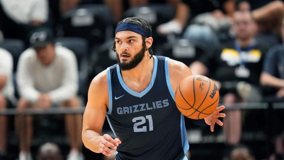 Memphis Grizzlies forward David Roddy (21) brings the ball up court in the first half during an NBA Summer League basketball game against the Oklahoma City Thunder Wednesday, July 5, 2023, in Salt Lake City. (AP Photo/Rick Bowmer)