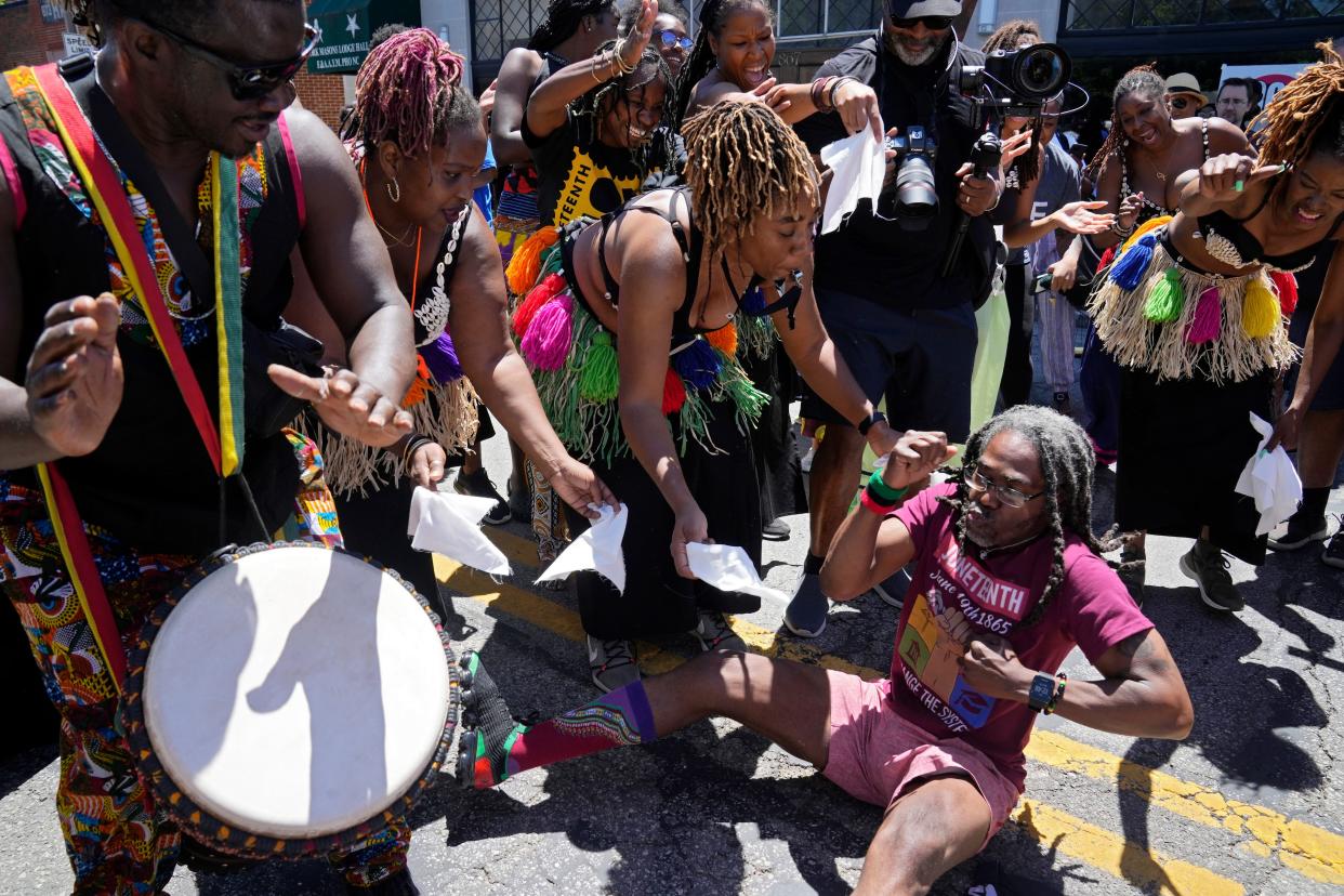 Dancers invited spectators to join them on Mount Vernon Avenue during the opening of the first Juneteenth on the Ave. on June 18, 2022.