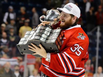 QUEBEC CITY, QC - MAY 31: Goaltender Ken Appleby #35 of the Oshawa Generals hugs the Memorial Cup after defeating the Kelowna Rockets during the 2015 Memorial Cup Championship at the Pepsi Coliseum on May 31, 2015 in Quebec City, Quebec, Canada. The Oshawa Generals defeated the Kelowna Rockets 2-1 in overtime and become the 2015 Memorial Cup Champions. (Photo by Minas Panagiotakis/Getty Images)