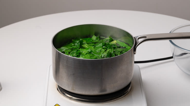 boiling collard greens in pan