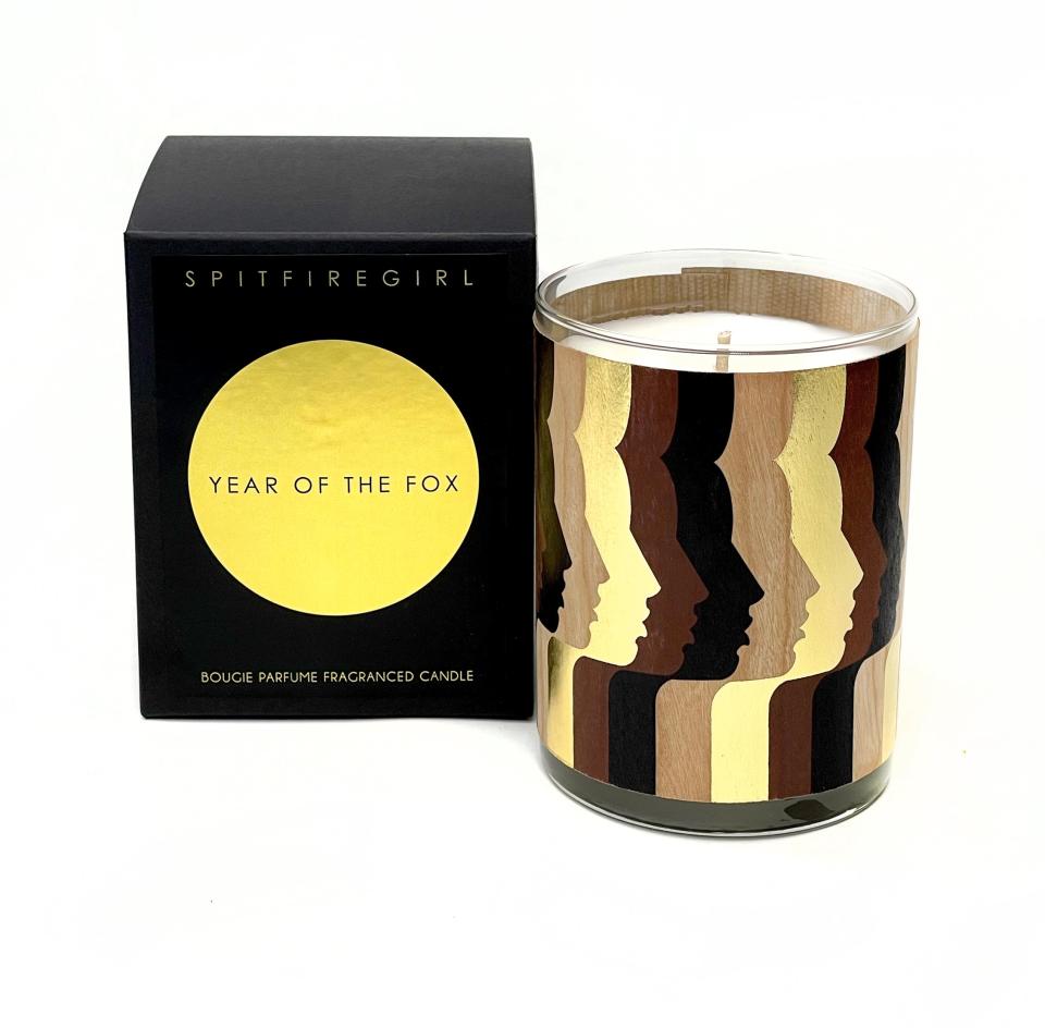 <p><a href="https://www.spitfiregirl.com/collections/candles-1/products/gold-foil-wood-wrapped-candle-year-of-the-fox" rel="nofollow noopener" target="_blank" data-ylk="slk:Shop Now;elm:context_link;itc:0;sec:content-canvas" class="link ">Shop Now</a></p><p>Spitfire Girl Year of the Fox Candle</p><p>spitfiregirl.com</p><p>$40.00</p><span class="copyright">Spitfire Girl</span>