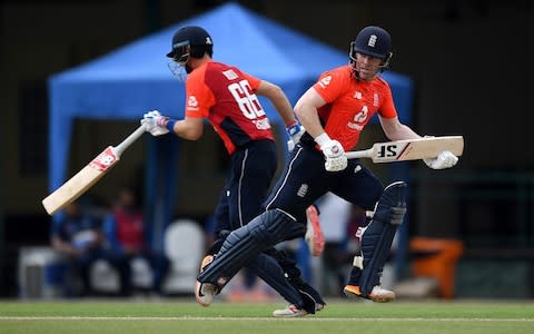 Joe Root and Eoin Morgan set off for a single - Credit: getty images