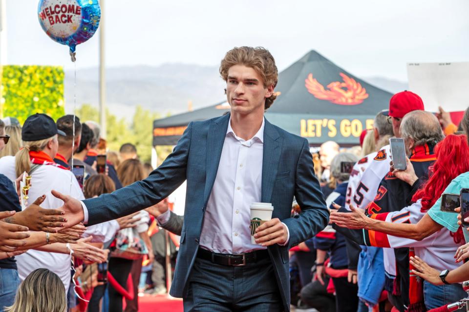 Ryan Winterton of the Coachella Valley Firebirds walks the red carpet upon arrival for the season opener against the Bakersfield Condors at Acrisure Arena in Palm Desert, Calif., on Friday, Oct. 13, 2023.