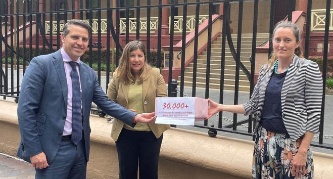 A photo Shadow Health Minister Ryan Park and State Member for Canterbury Sophie Cotsis being handed a petition calling on the NSW Health Minister Brad Hazzard to immediately reopen all BreastScreen NSW clinics across the state. Source: Change.org