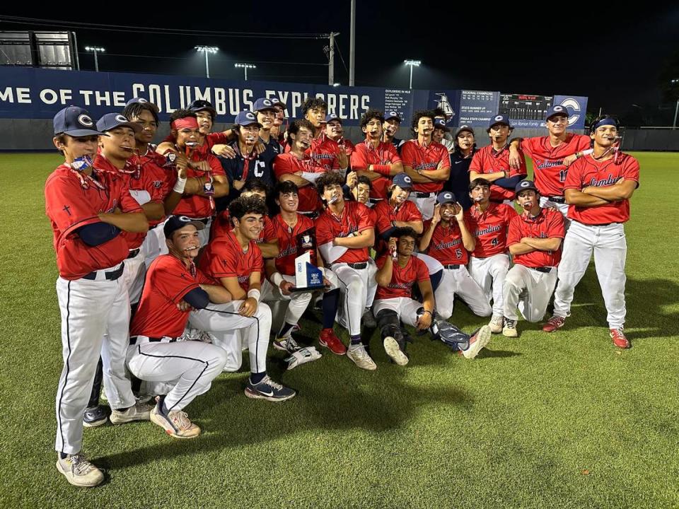 Columbus’ baseball team celebrates after beating Varela 5-4 in eight innings to claim the GMAC championship.