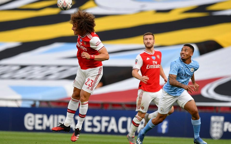 David Luiz clears the danger for Arsenal - AFP