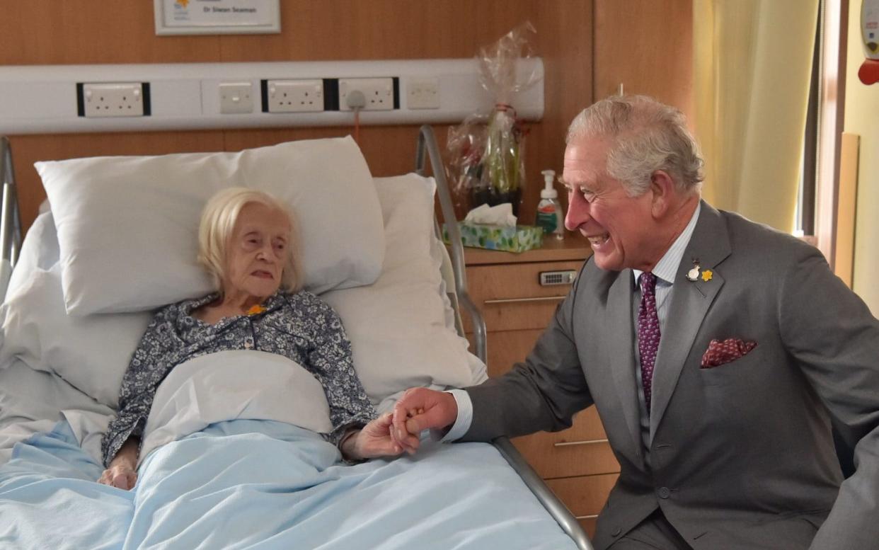 The Prince of Wales meeting patient Maureen Russell, 97, during a visit to the Marie Curie Hospice in Cardiff and the Vale, Wales. PA Photo. Picture date: Friday February 21, 2020. See PA story ROYAL Charles. Photo credit should read: Ben Birchall/PA Wire - Ben Birchall/PA Wire