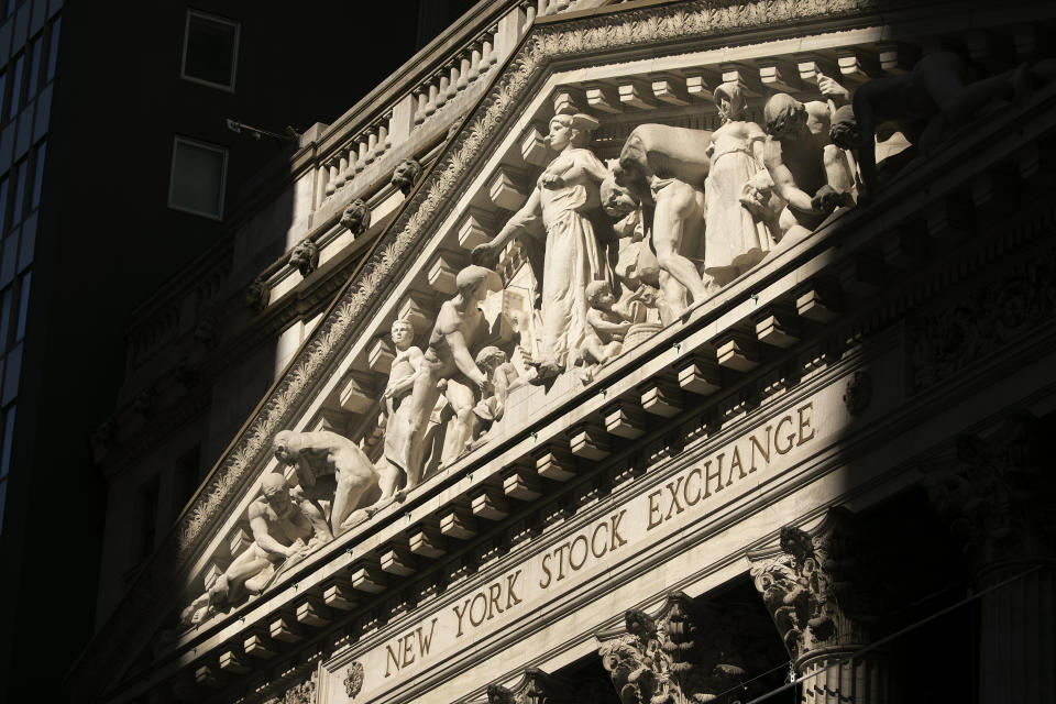 The New York Stock Exchange is shown, Tuesday, July 21, 2020. Stocks are holding on to their gains, Wednesday, July 29, on Wall Street after the Federal Reserve said it will keep the accelerator floored on its aid for the economy. (AP Photo/Mark Lennihan)