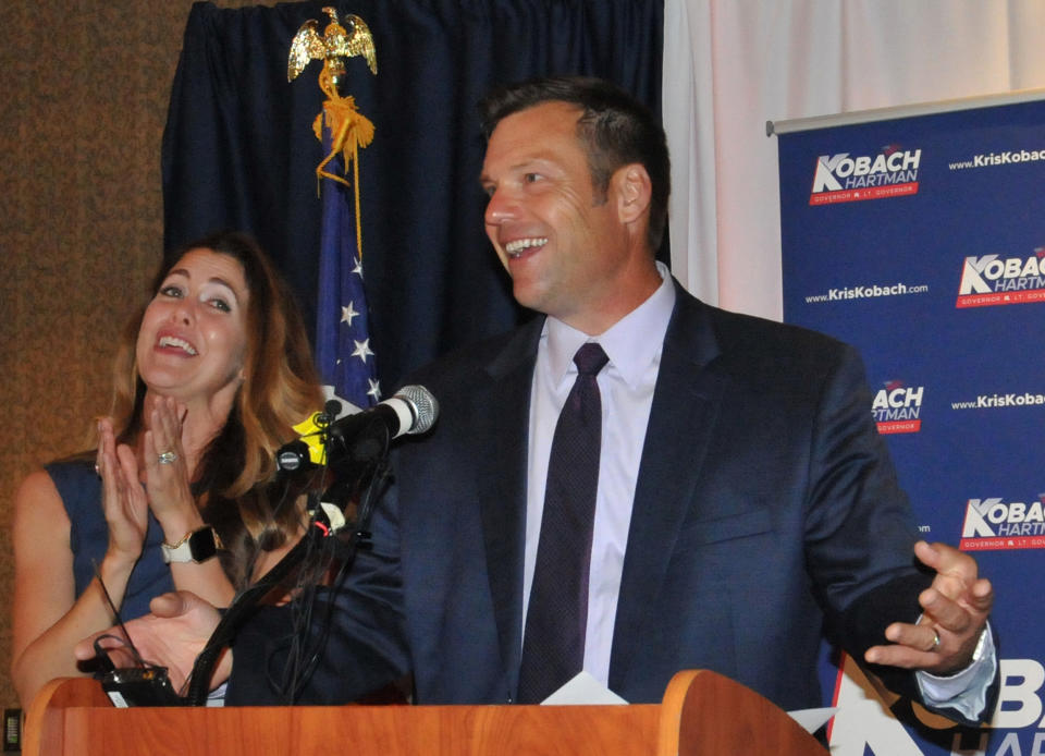 Republican primary candidate for Governor Kris Kobach, and his wife Heather Kobach speaks to supporters just after midnight in a tight race with Jeff Colyer that is too close to call on August 7, 2018 in Topeka, Kansas. (Photo: Steve Pope/Getty Images)