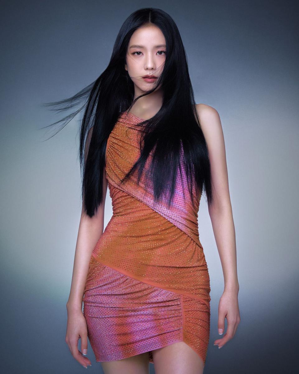 Jisoo wears Self-Portrait's Orange Rhinestone Mini Dress, £370, self-portrait.com (©self-portrait/Yoon JiYong)