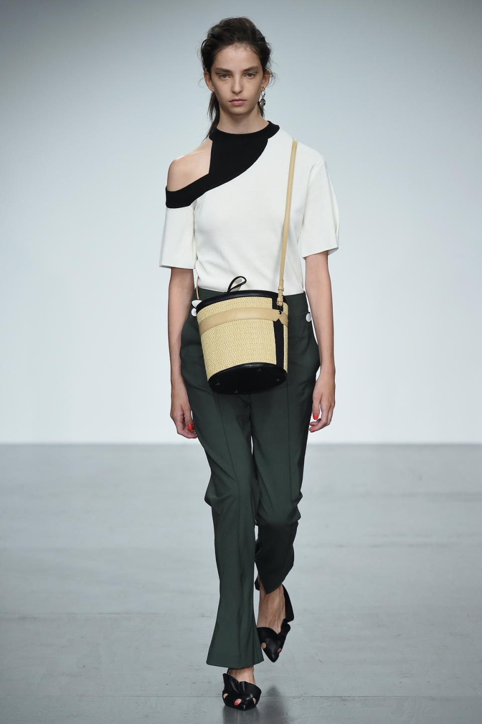 <p>Eudon Choi’s straw bucket bags were also on-point. <em>[Photo: Eudon Choi]</em> </p>