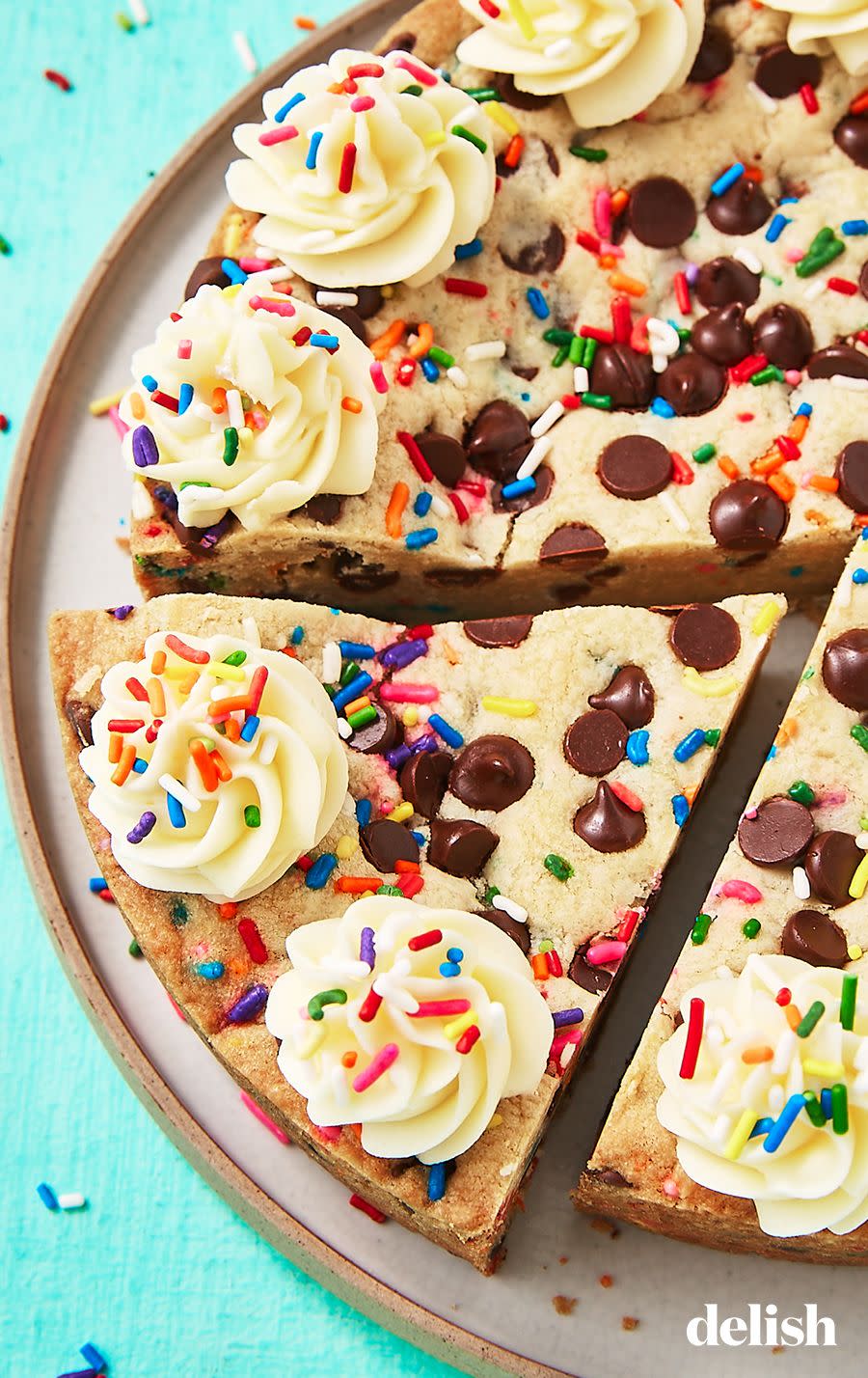 <p>Celebrate Easter with this fun, colorful cookie cake. </p><p>Get the recipe from <a href="https://www.delish.com/cooking/recipe-ideas/recipes/a51529/cookie-cake-recipe/" rel="nofollow noopener" target="_blank" data-ylk="slk:Delish;elm:context_link;itc:0;sec:content-canvas" class="link ">Delish</a>.<br></p>