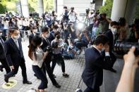 Samsung Group heir Jay Y. Lee arrives for a court hearing to review a detention warrant request against him at the Seoul Central District Court in Seoul