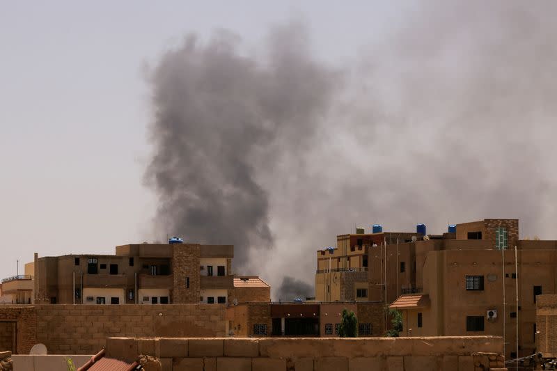 FILE PHOTO: Smoke is seen rise from buildings in Khartoum North