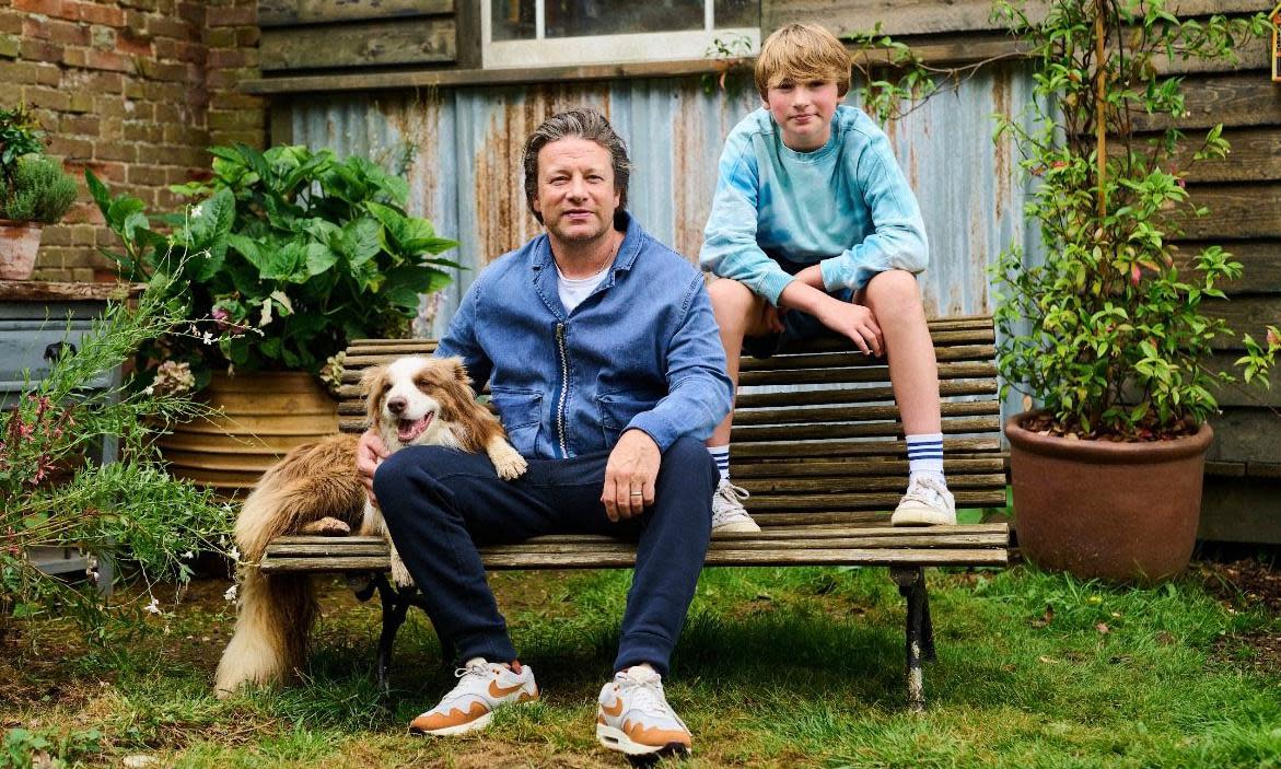 <span>Buddy Oliver with his dad Jamie in Cooking Buddies.</span><span>Photograph: Samantha Beddoes/BBC/Jamie Oliver Group</span>