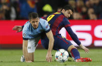 Football - FC Barcelona v Manchester City - UEFA Champions League Second Round Second Leg - The Nou Camp, Barcelona, Spain - 18/3/15 Manchester City's Martin Demichelis in action with Barcelona's Luis Suarez Action Images via Reuters / Carl Recine Livepic EDITORIAL USE ONLY.