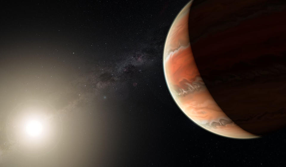 Artist's illustration showing the exoplanet WASP-19b, whose atmosphere contains titanium oxide. In large enough quantities, titanium oxide can prevent heat from entering or escaping an atmosphere, leading to a "thermal inversion" in which temperatures are higher in the upper atmosphere than lower down. <cite>ESO/M. Kornmesser</cite>