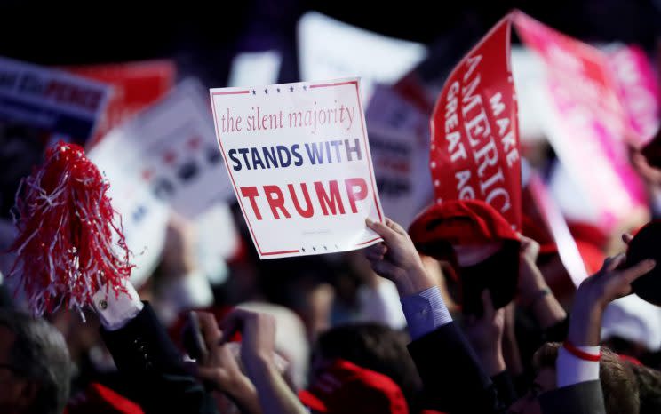 People wave signs in support of president-elect Donald Trump during his election night event in New York City on November 8, 2016. (Photo: Spencer Platt/Getty Images)