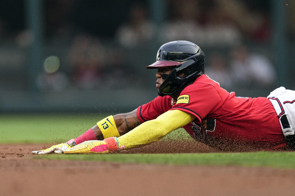 Atlanta Braves' Ronald Acuna Jr. steals second base in the first inning of a baseball game against the Chicago White Sox, Friday, July 14, 2023, in Atlanta. (AP Photo/John Bazemore)