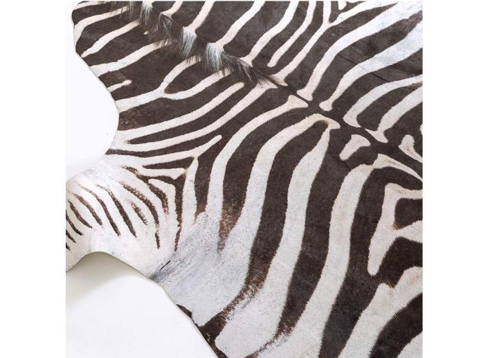 This zebra print rug can add a super fun vibe to any room. (Source: Amazon)
